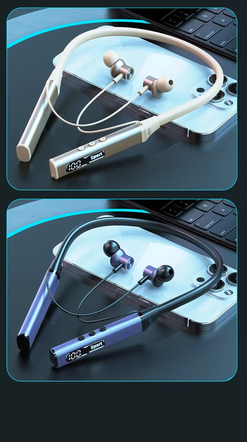 Two pairs of wireless neckband headphones on a laptop keyboard with a blurred background.