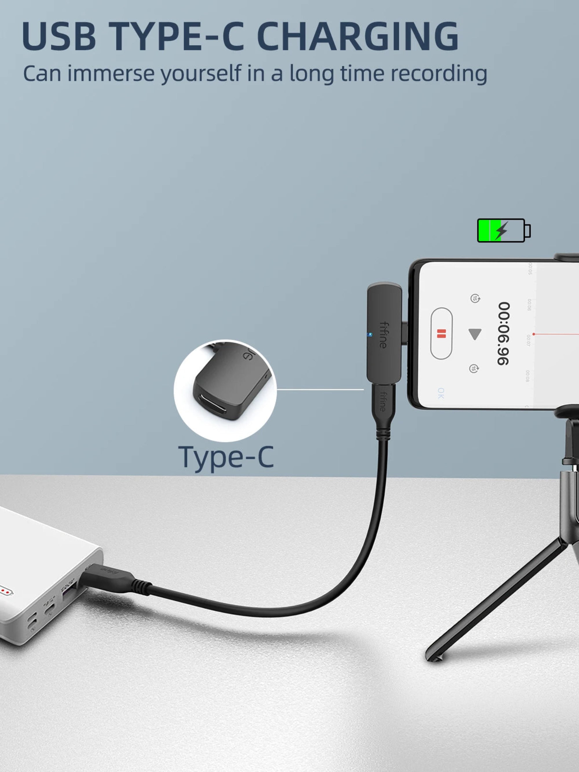 USB Type-C charging setup with smartphone, microphone, and power bank on a light gray background
