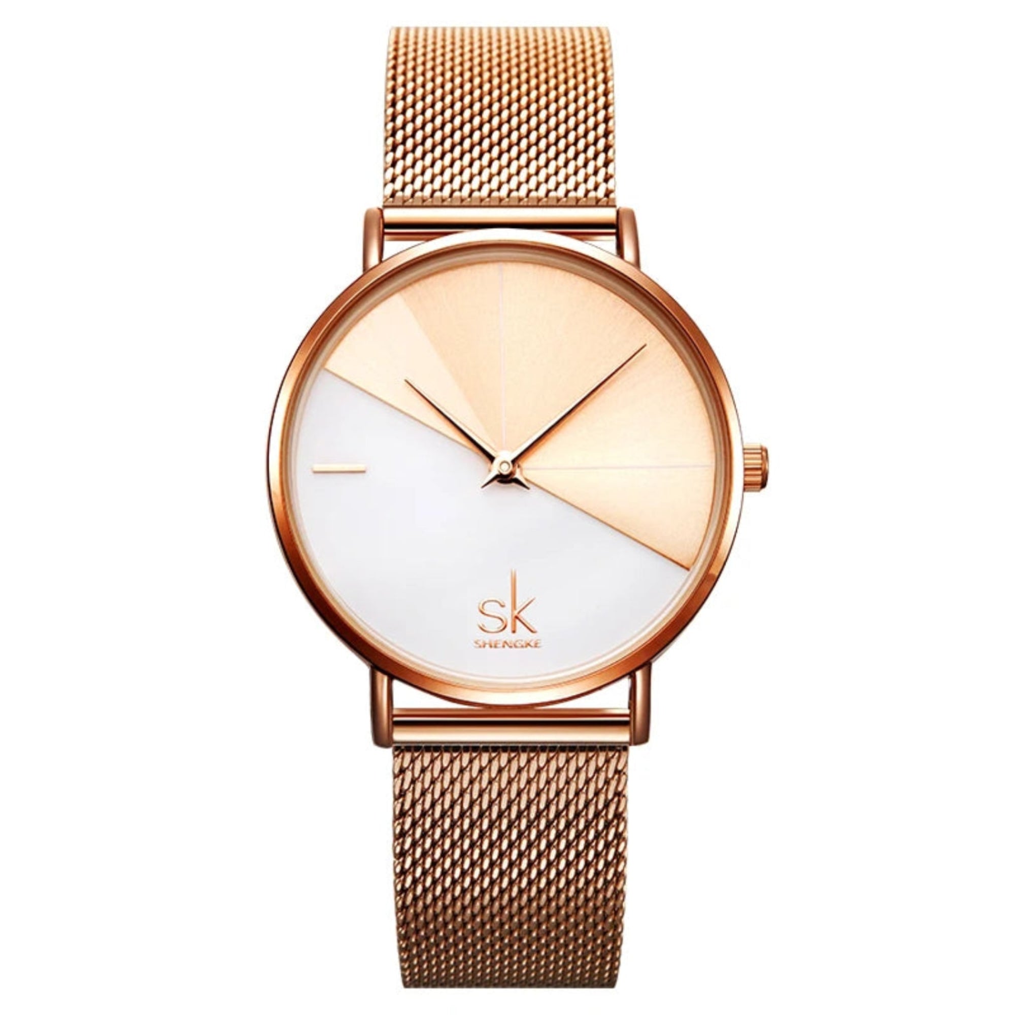 A woman wearing a Shengke quartz wristwatch with a rose gold case and a brown leather strap.