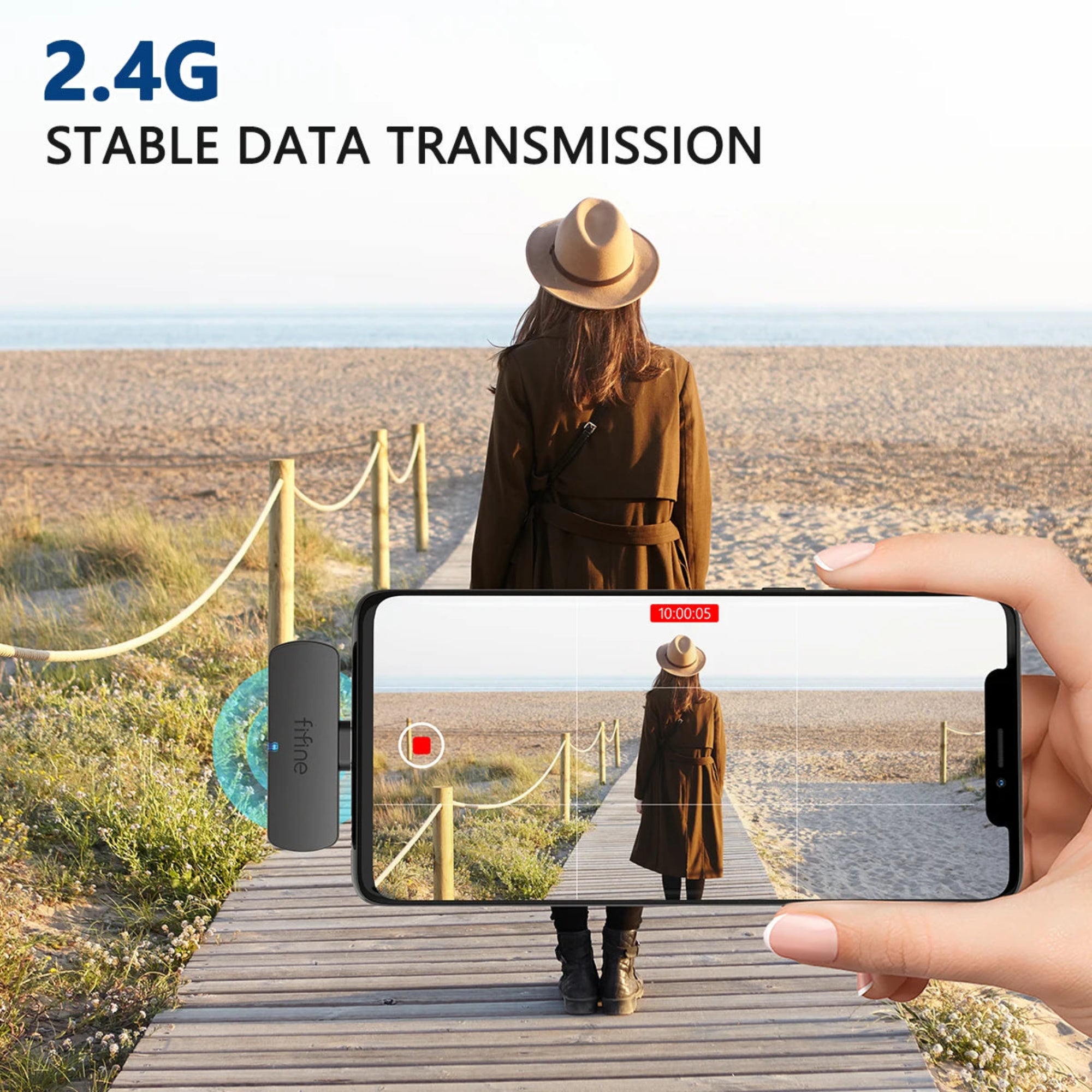 Person holding a smartphone with a video call interface, showing a person on a wooden bridge with '2.4G Stable Data Transmission' text.