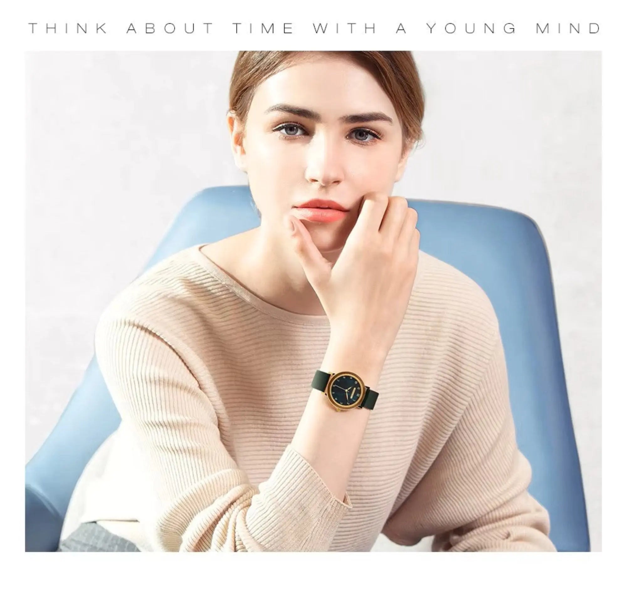 Woman wearing a watch with text 'Think about time with a young mind' on a light background