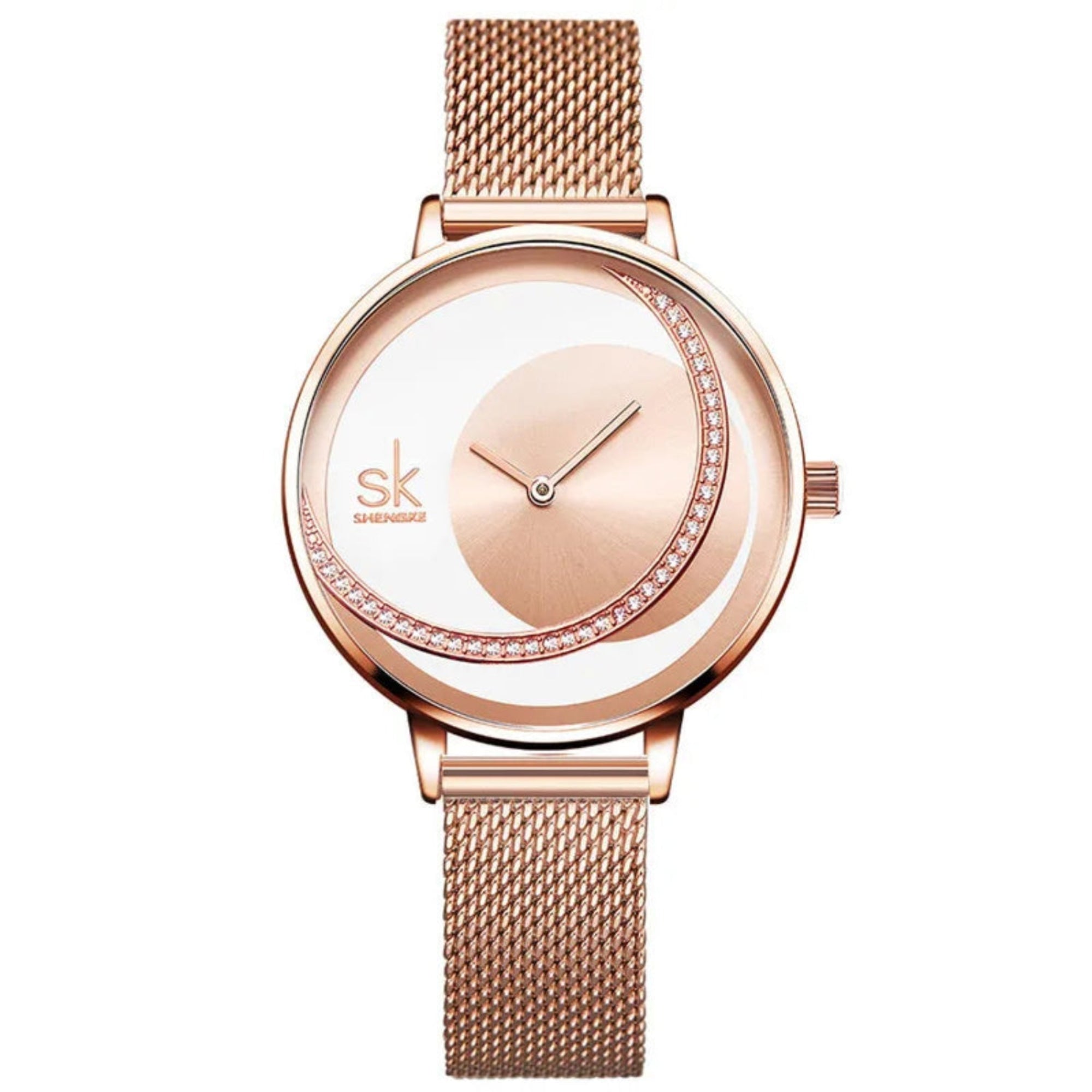 A woman wearing a Shengke brand analog watch with a rose gold case and a rose gold mesh band.