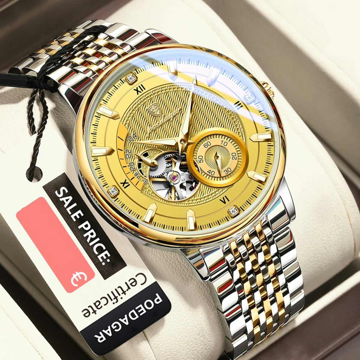 Luxury watch with gold and silver design on a white cushion, accompanied by a sale price tag.