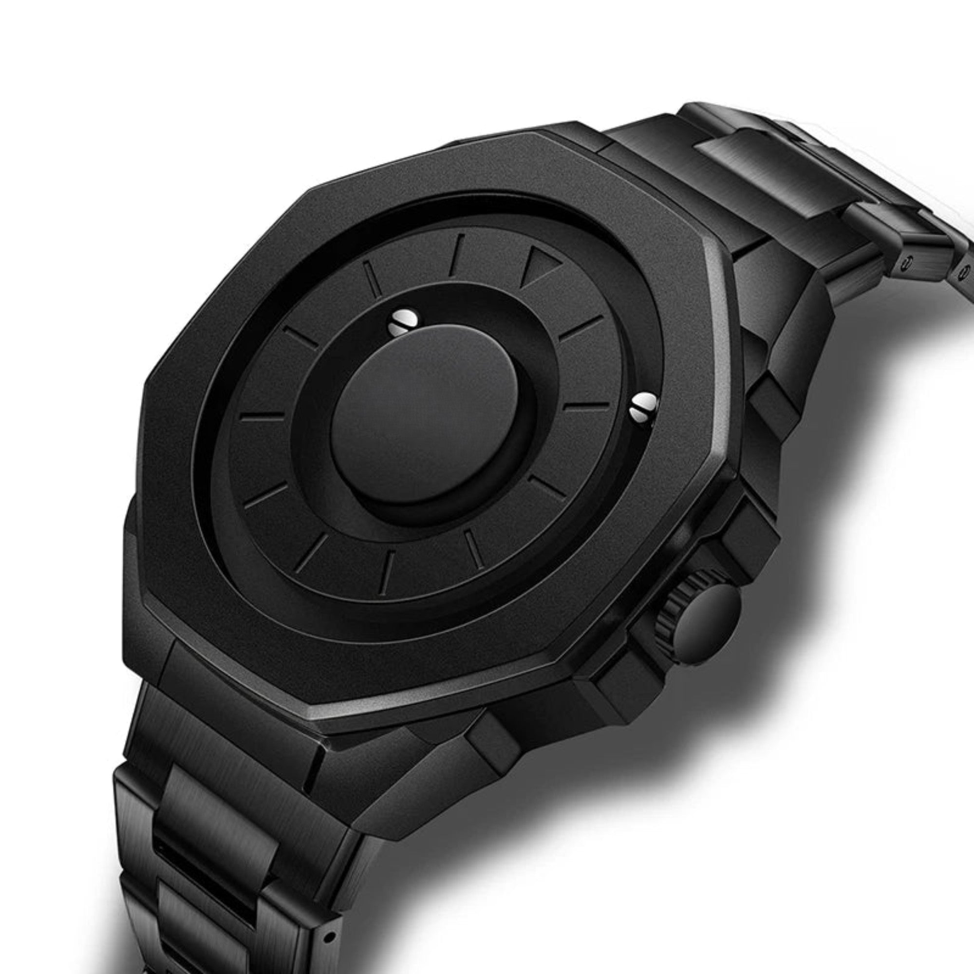 A black analog watch with a textured dial and a metallic band, viewed from a side angle.