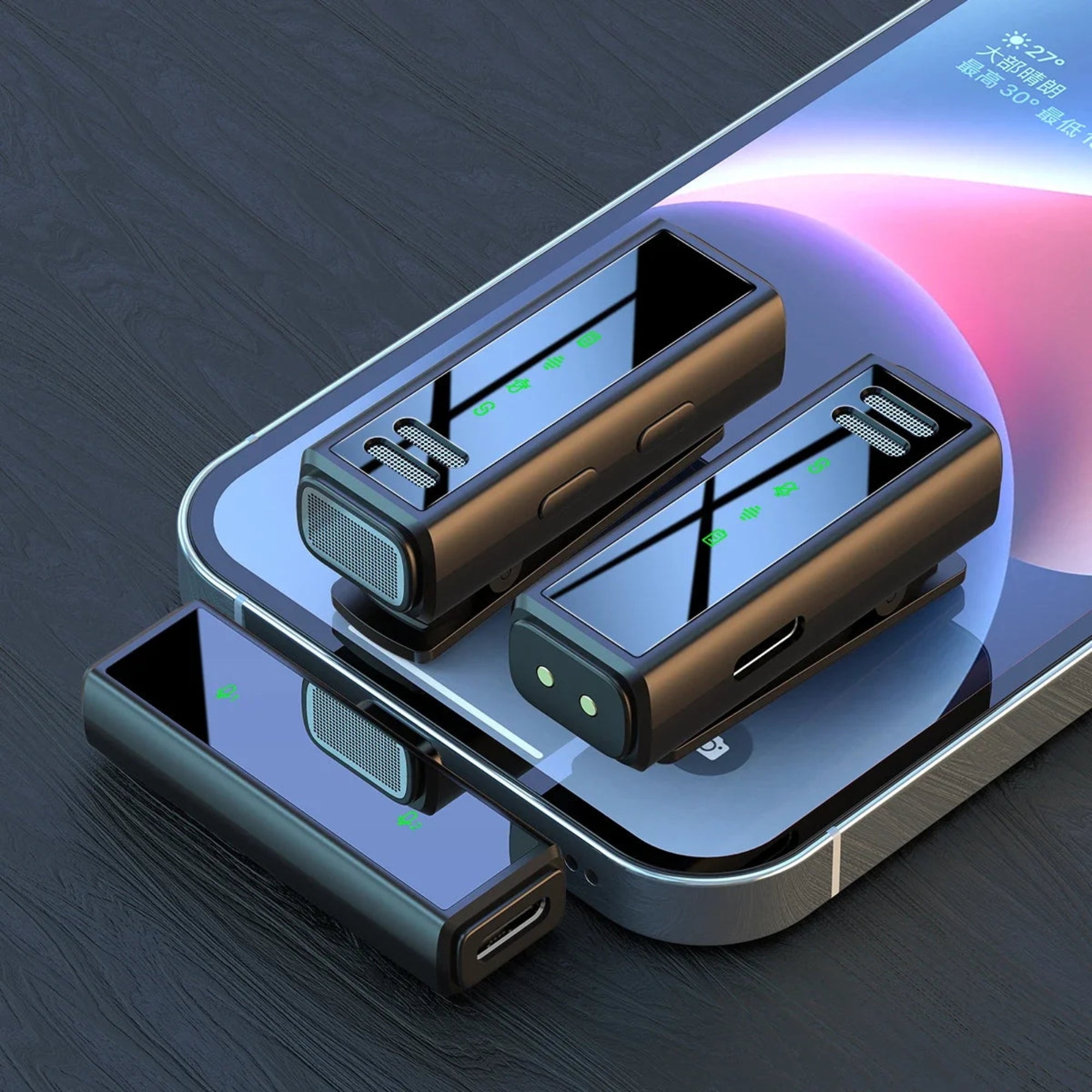 Two metallic USB drives on a smartphone screen with a dark wooden background