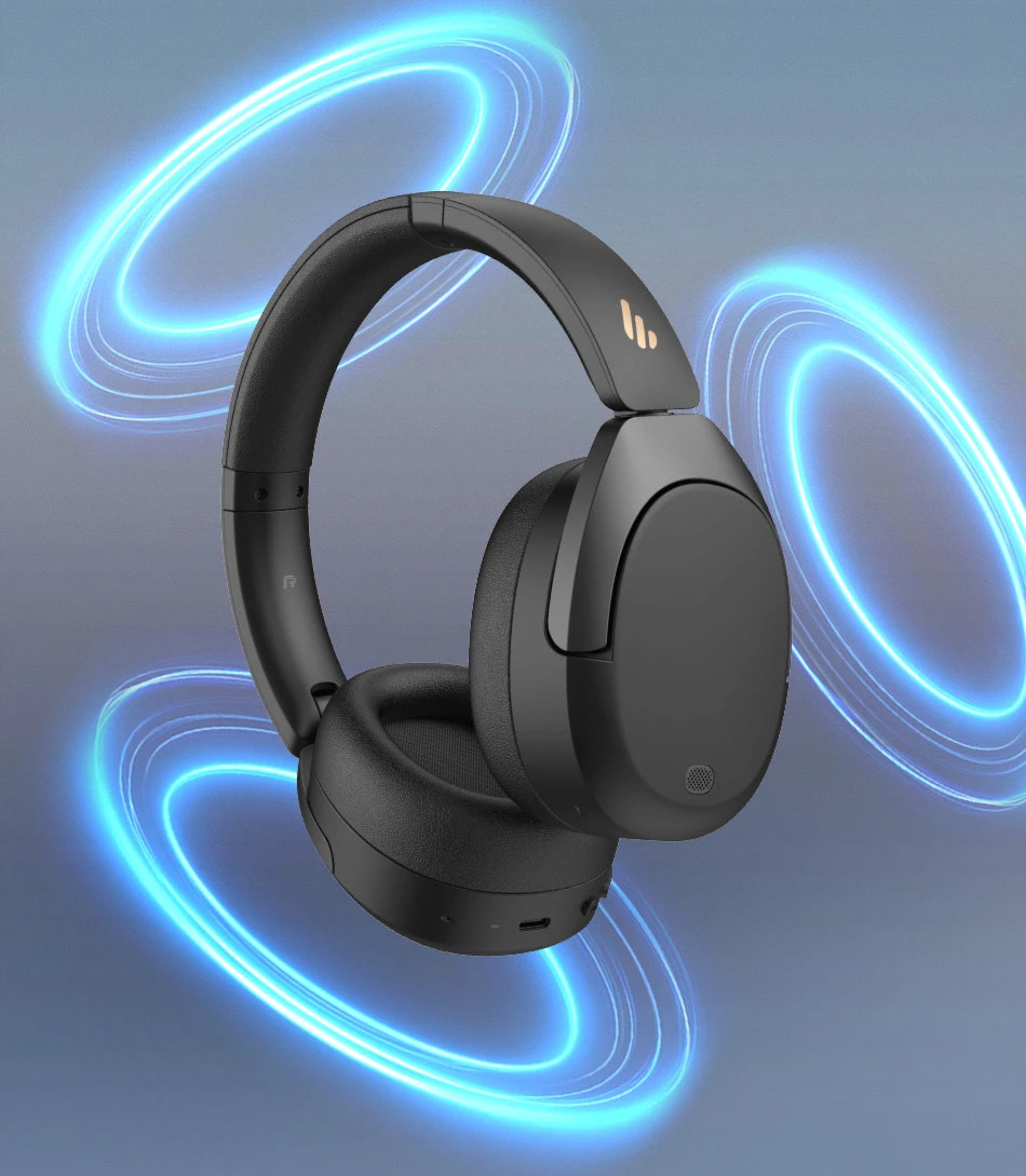 Black headphones with blue light effects on a gray background