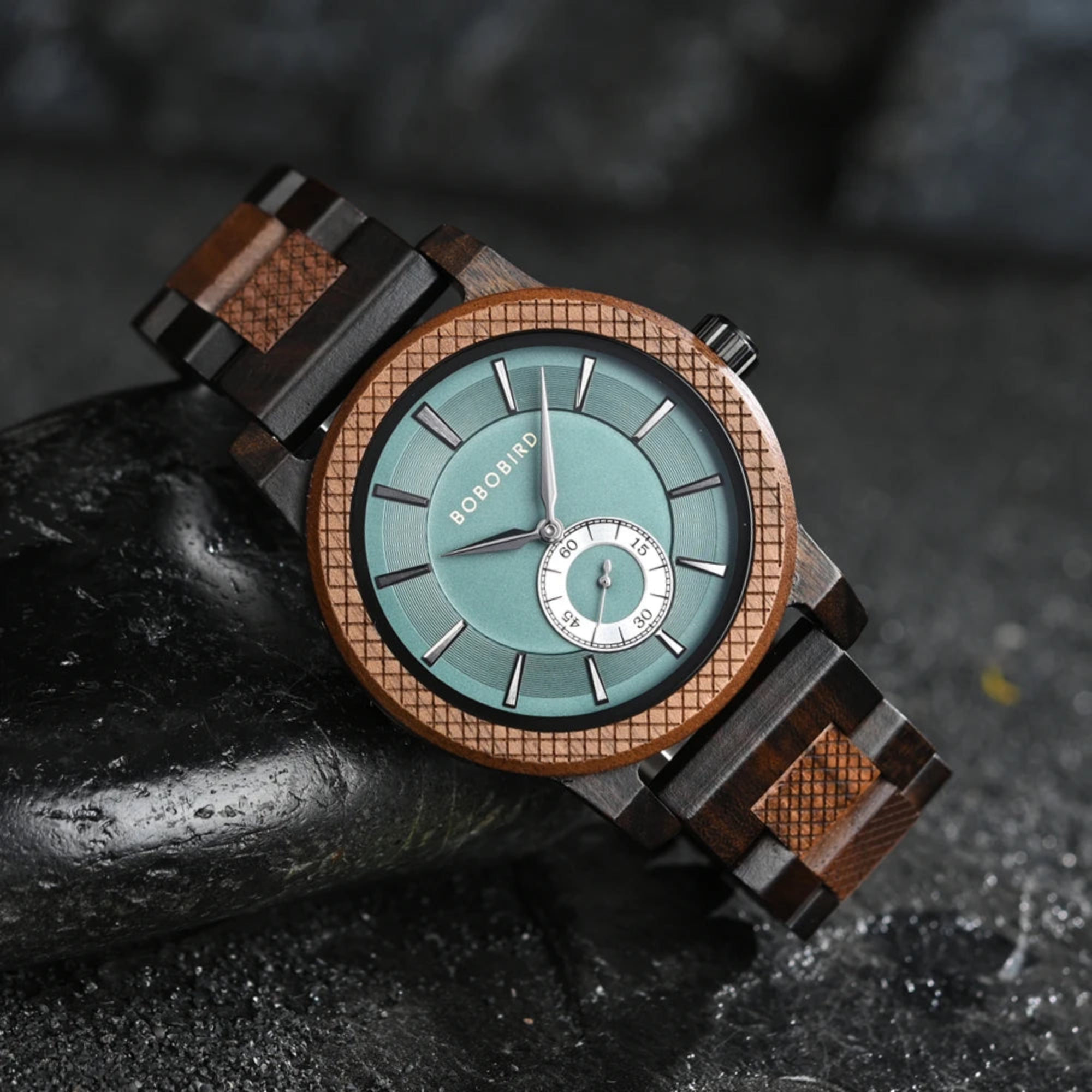 Wooden watch with a blue face on a dark textured background