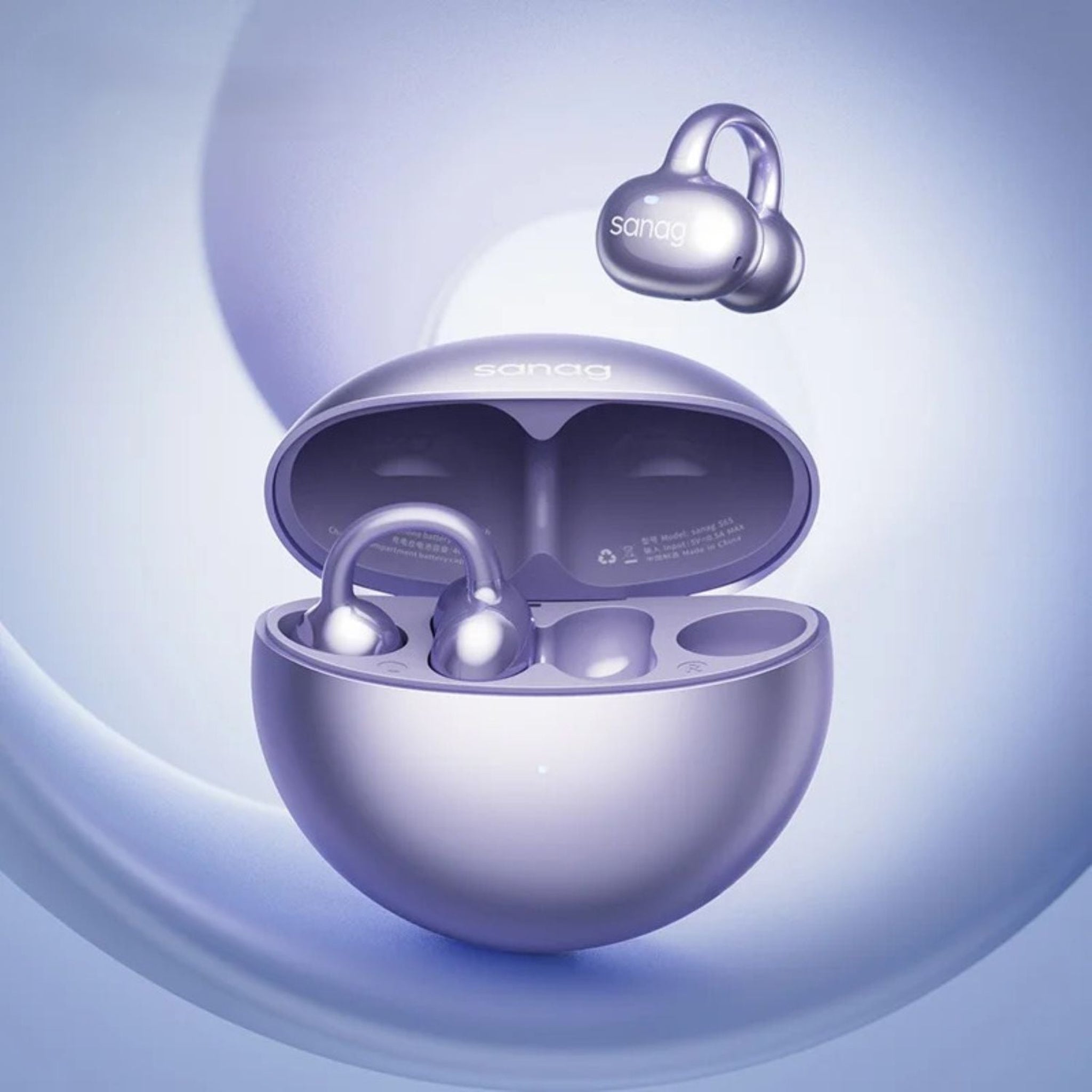 Purple wireless earbuds in an open case on a light purple background