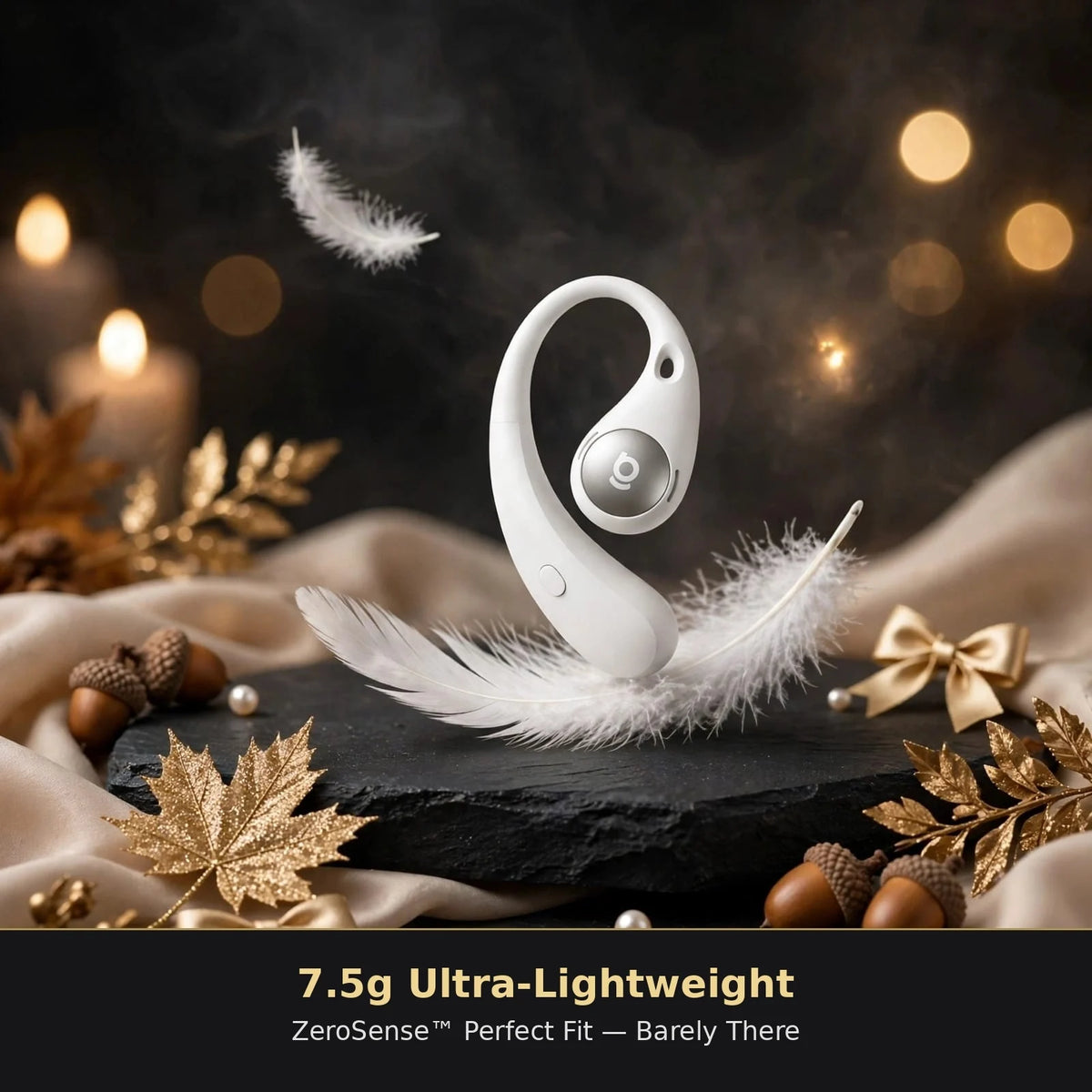 White Baseus Eli Sport 2 ultra-lightweight 7.5g open-ear earbud balancing on white feather showing ZeroSense perfect fit on black slate with gold leaves and candle bokeh