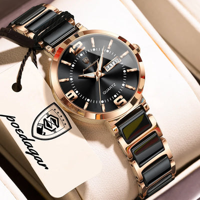A women's quartz watch with a black ceramic link bracelet, rose gold case, and black dial, presented in a cream-colored gift box with a branded hangtag.