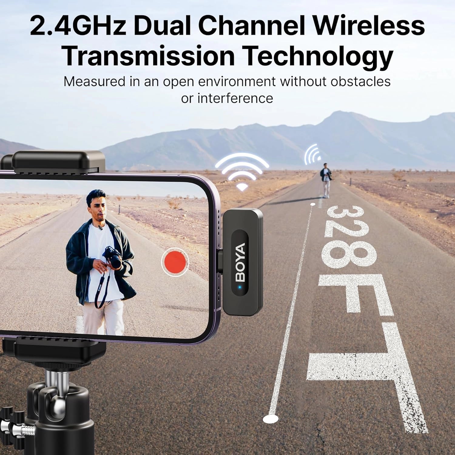 BOYA wireless microphone transmitter on a phone with a scenic road background