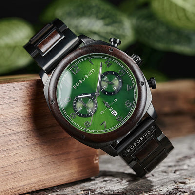 Green watch with wooden accents on a natural background