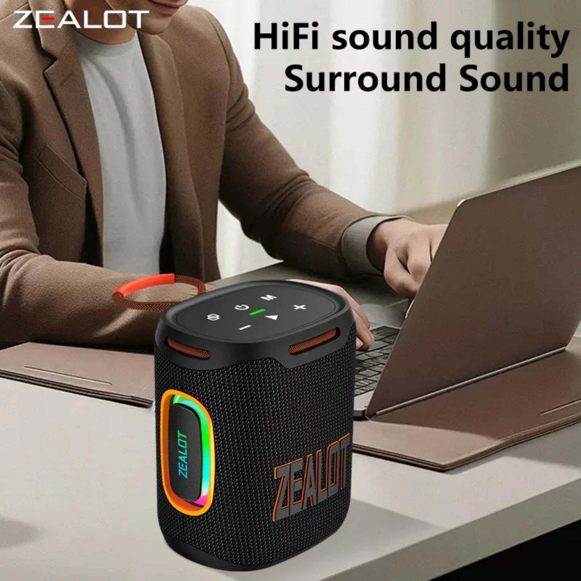 ZEALOT Bluetooth speaker with a person using a laptop in the background, emphasizing HiFi sound quality and surround sound.