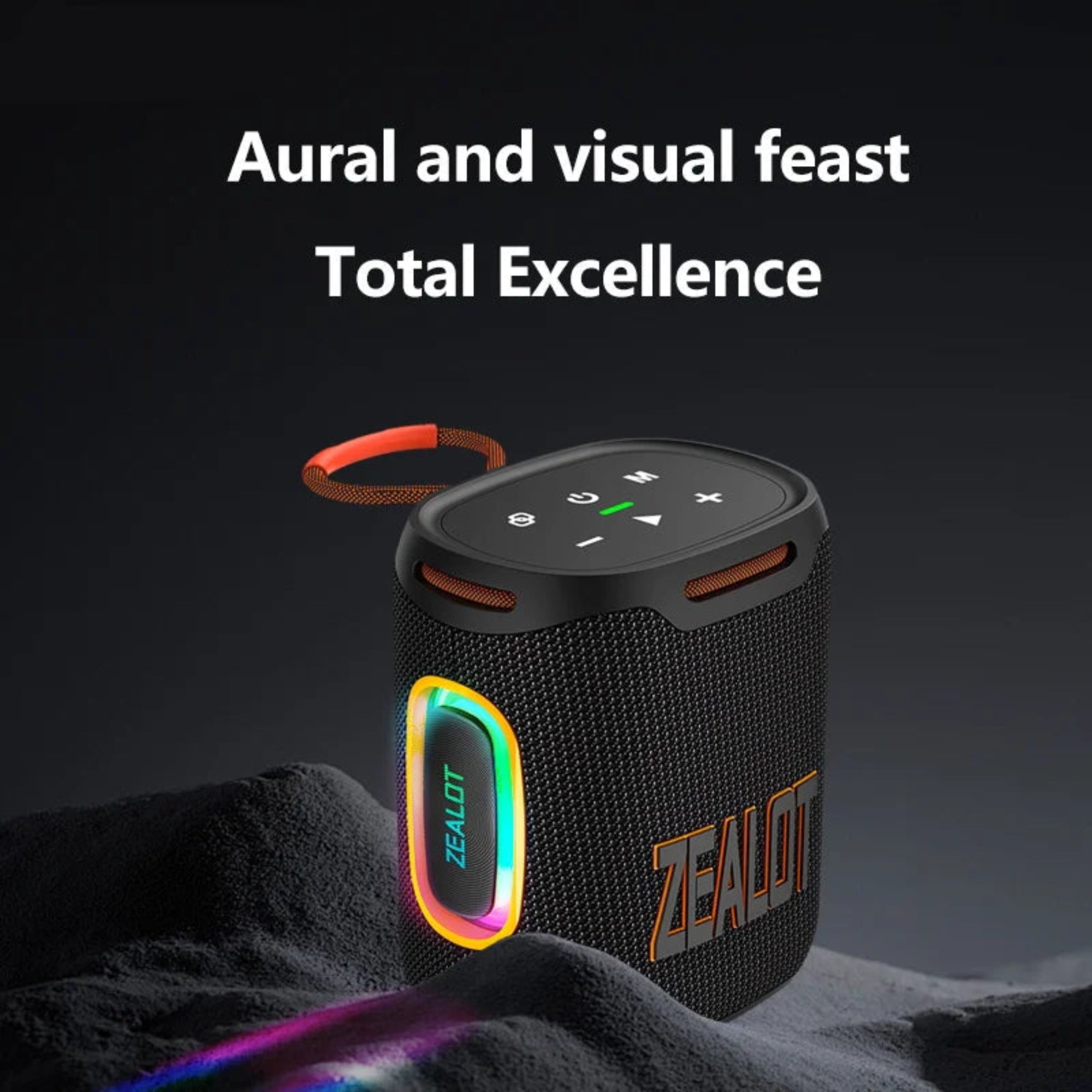 Black portable speaker with colorful LED lights on a dark background, featuring the brand 'ZEALOT'.