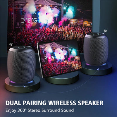 Dual pairing wireless speakers with a tablet displaying a concert scene, emphasizing stereo sound quality.