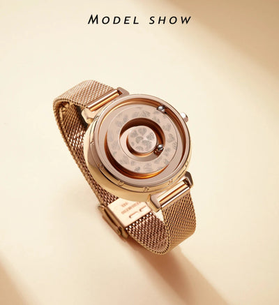Gold watch with intricate design on a beige background, featuring the brand 'Model Show'.