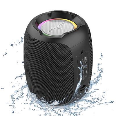 A portable Bluetooth speaker in black color with a colorful LED light on top, surrounded by water indicating its waterproof feature.