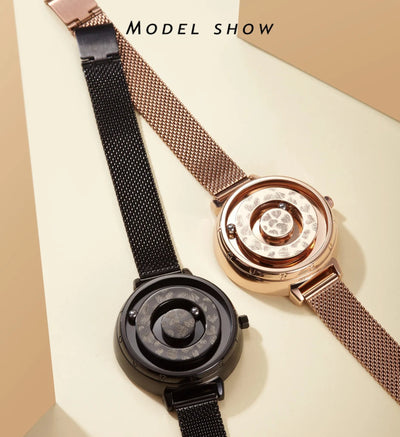 Two watches with black and rose gold mesh straps on a beige background, labeled 'Model Show'.