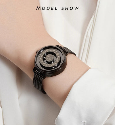 Black smartwatch on a person's wrist with a white background