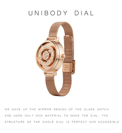 Rose gold watch with mesh band on a white background