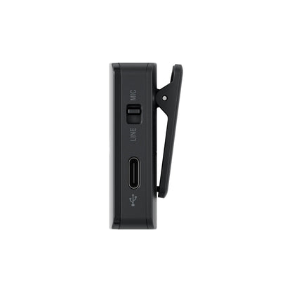 Black clip-on device with ports on a white background
