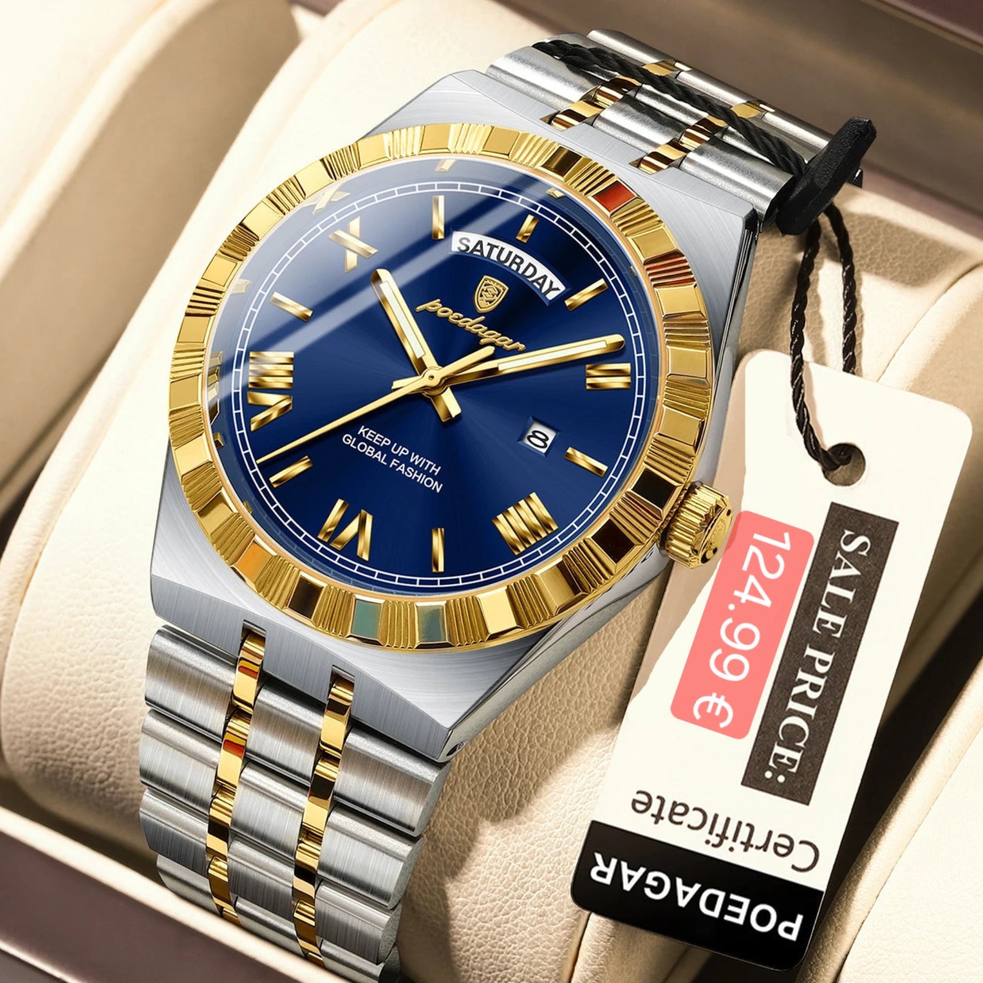Luxury watch with blue face and gold accents on a beige cushion, featuring a visible price tag.