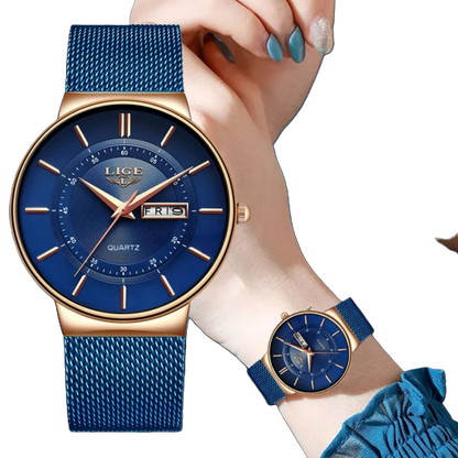 Blue watch with gold accents held by a hand, brand 'LIGE' visible