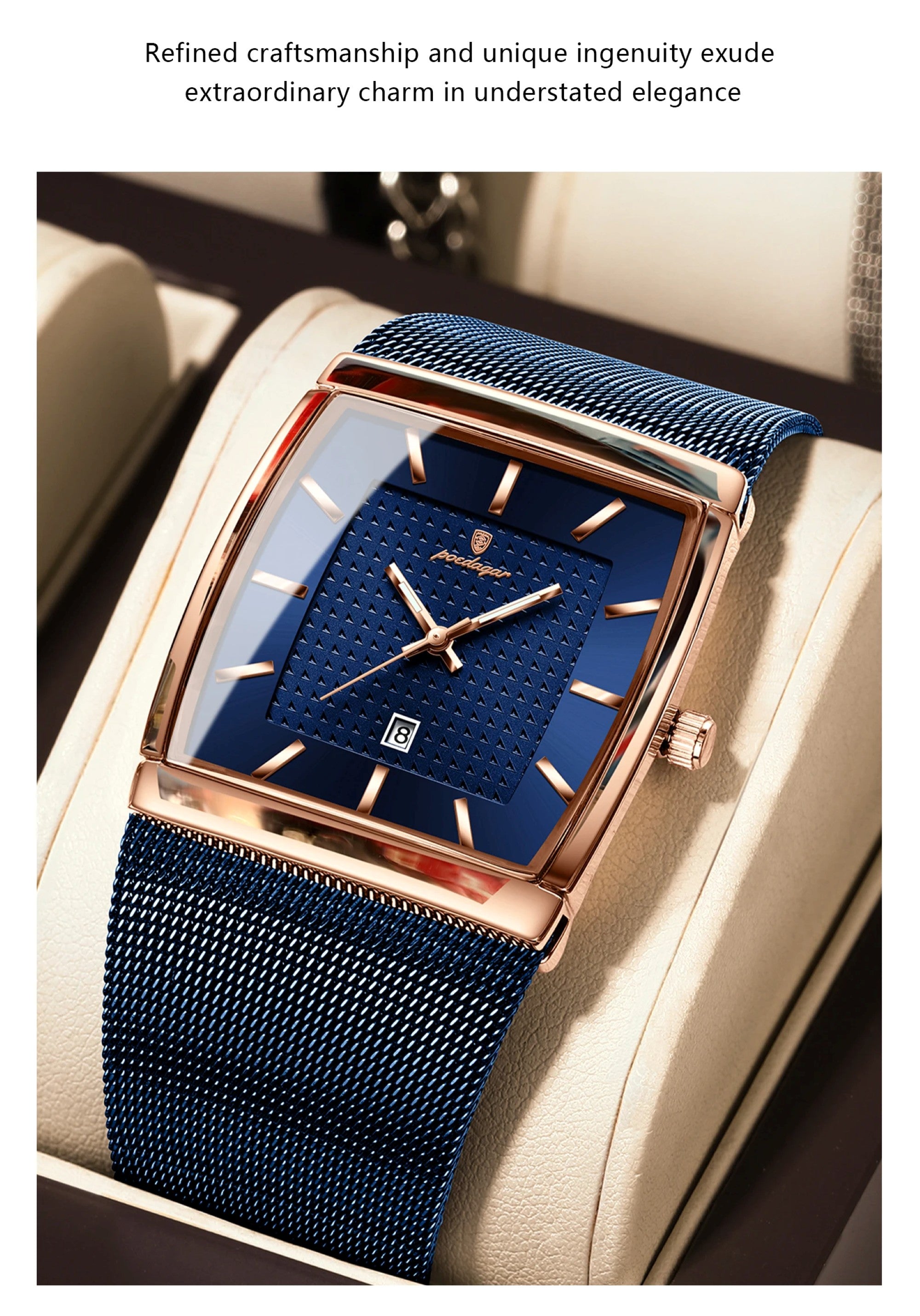 Luxury watch with blue strap and face on a beige surface
