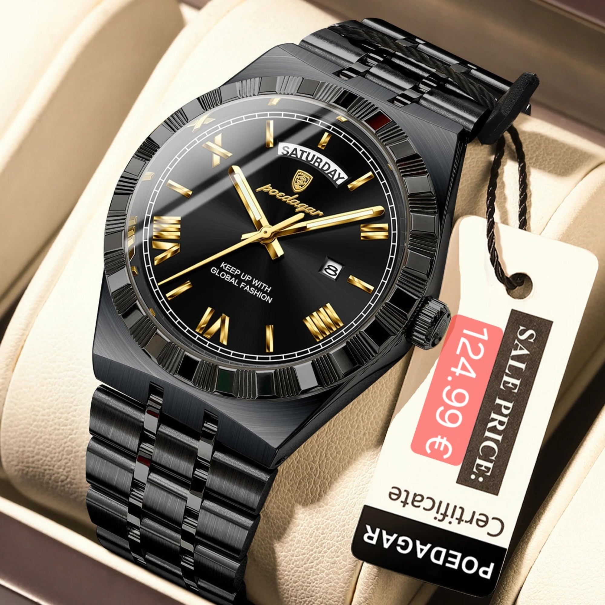 Black watch with gold accents on a beige cushion, featuring a 'PODEGAR' tag.