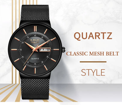 Black quartz watch with mesh band on a white background