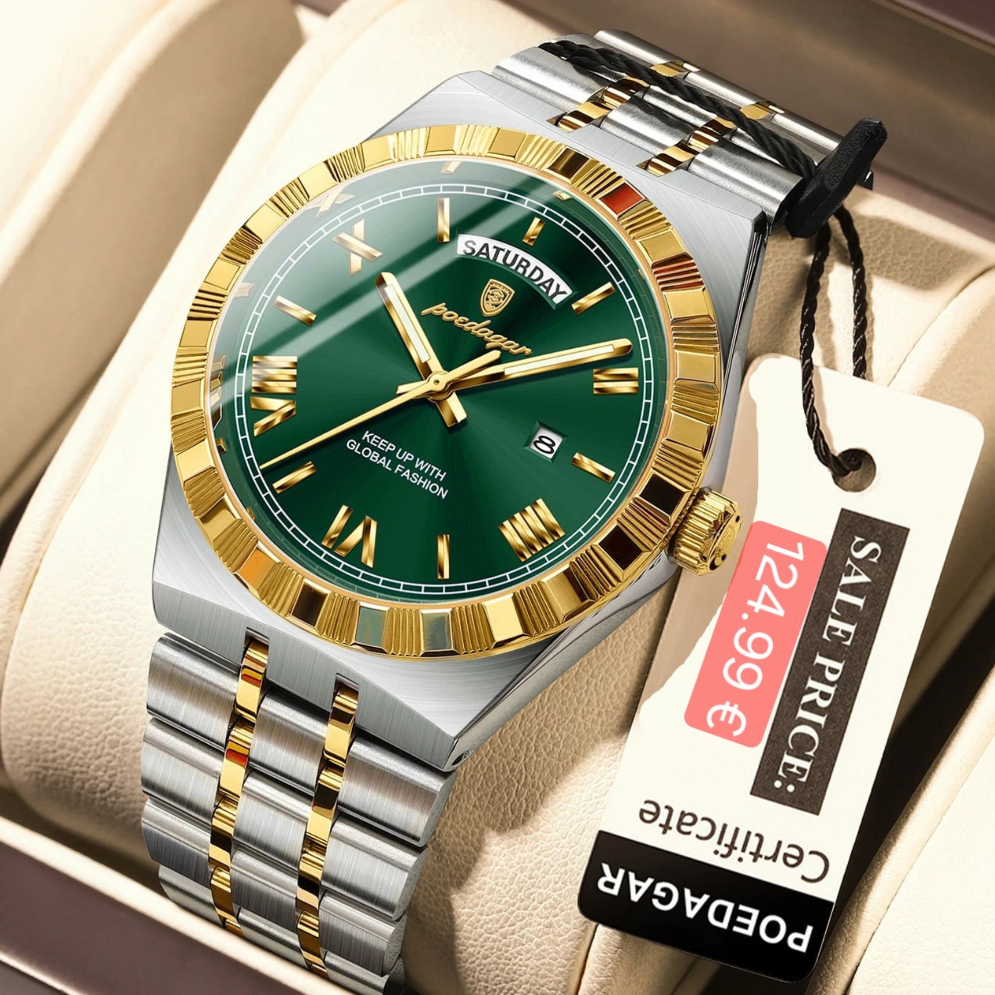 Green watch with gold and silver accents on a beige cushion, featuring a visible price tag.