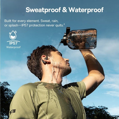 Person drinking from a sweatproof and waterproof bottle with a blue sky background