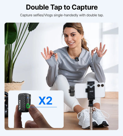 Woman using a BOYA BY-C9X2 microphone for video recording with text 'Double Tap to Capture' on a white background.