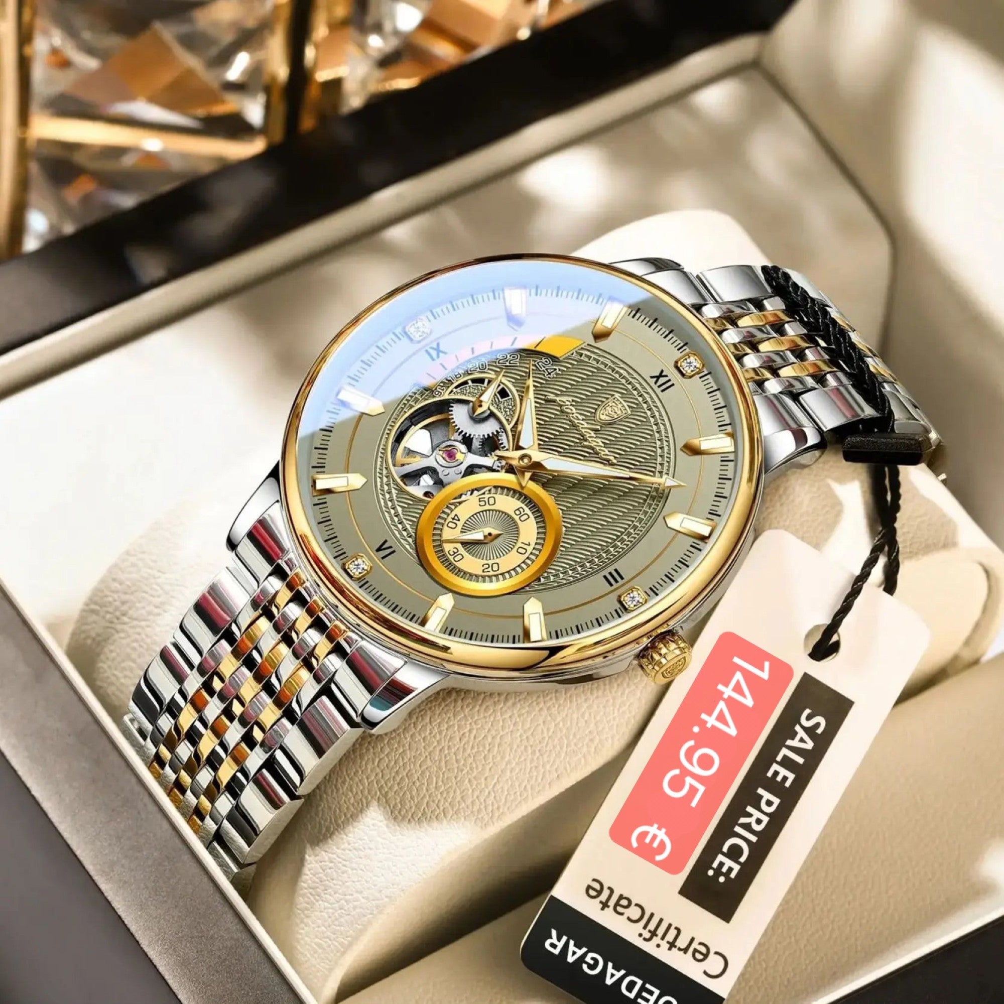 Luxury watch with gold and silver band in a box, featuring a visible price tag.