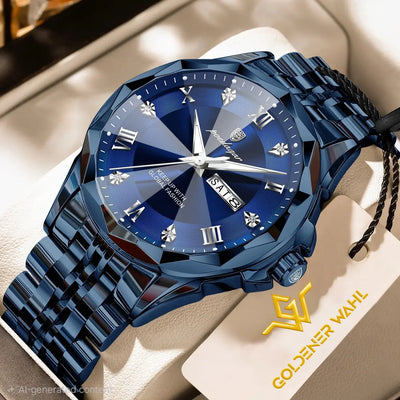 A luxury men's watch by Goldener Wahl, featuring a deep blue faceted bezel, a matching blue dial with Roman numerals and a day-date window, and a blue metal link bracelet. The watch is displayed on a beige cushion with its branded paper tag visible.