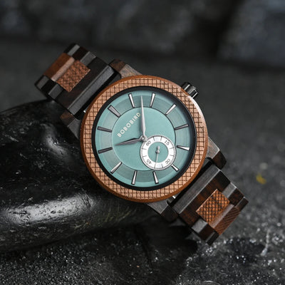 Wooden watch with a blue face on a dark textured background