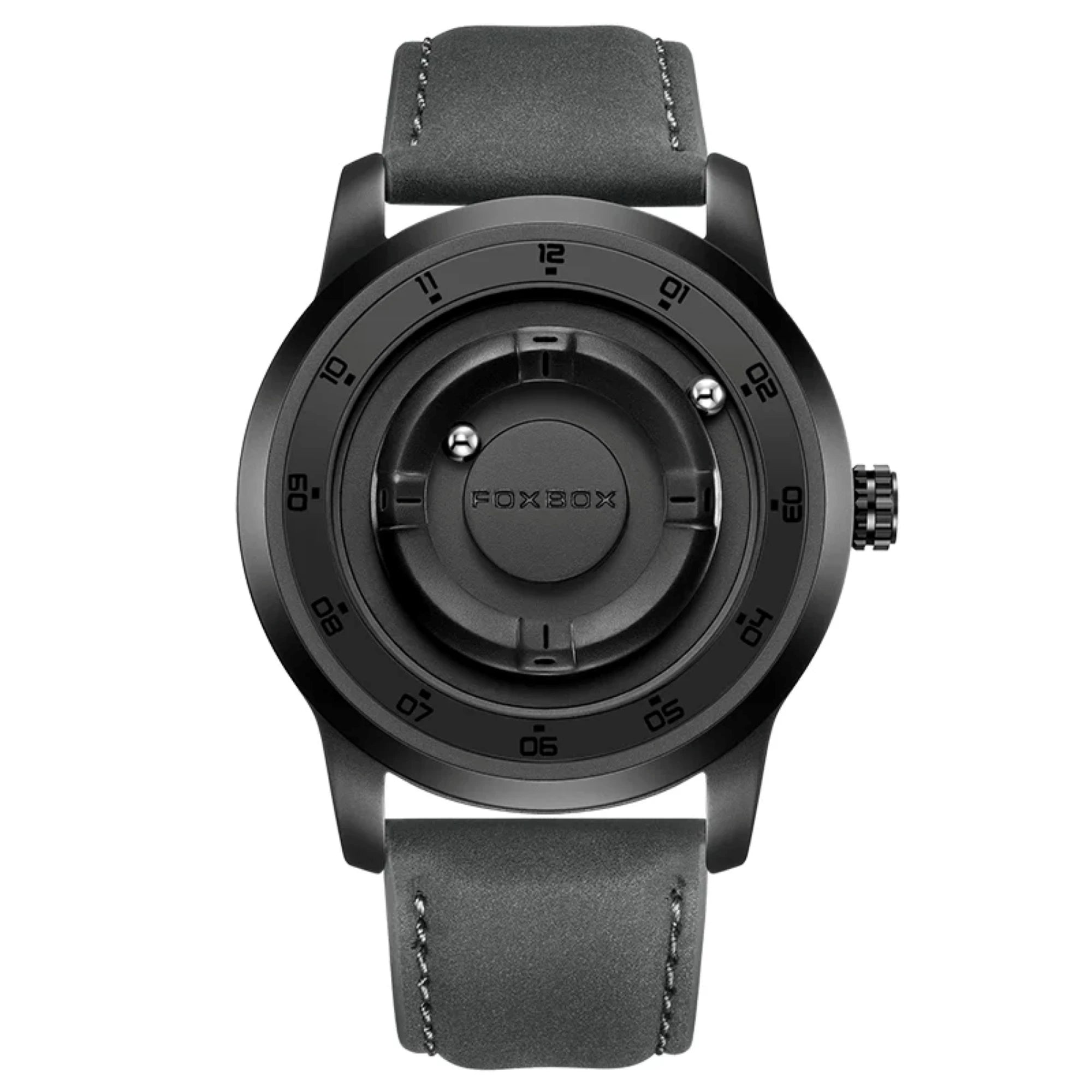 A black analog watch with a round bezel, black case, and a dark gray textured strap, shown against a plain white background. The brand name 'FOXZON' is visible on the center dial.
