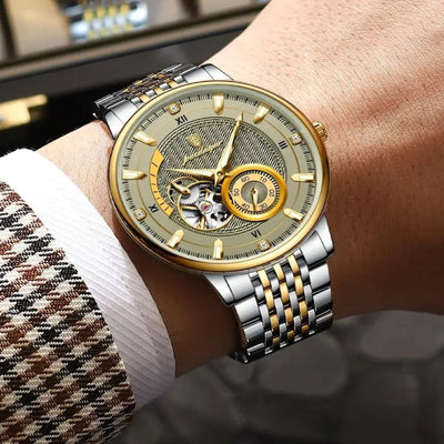 Luxury watch with silver and gold band on a wrist