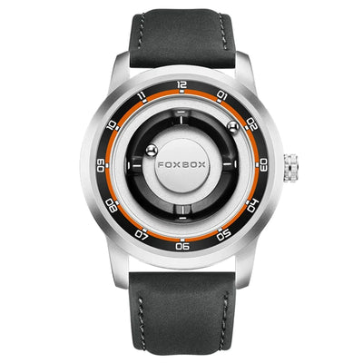 A silver-tone analog watch with a black leather strap, featuring a unique circular dial with black and orange accents and white numerals.
