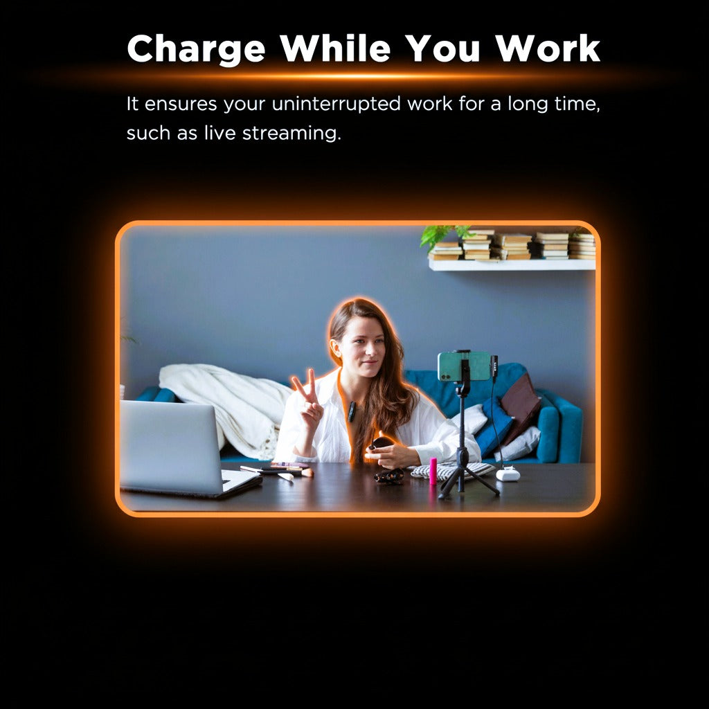 Woman live streaming from a desk with a phone and laptop, text 'Charge While You Work' at the top.