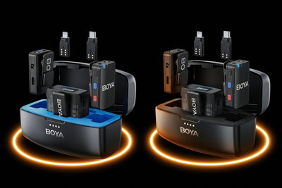 Two charging stations with multiple battery packs on a black background, featuring the BOYA brand.