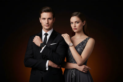 Man and woman in formal attire against a dark background