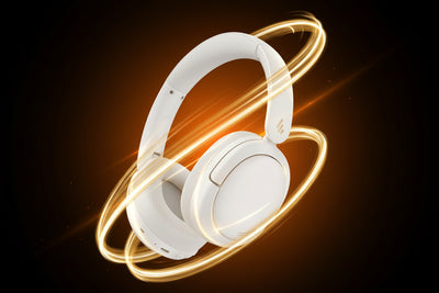 White headphones with gold accents on a white background