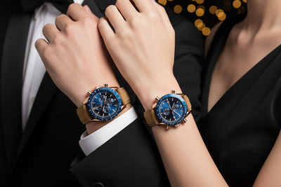 Two wrists wearing watches with a blurred background