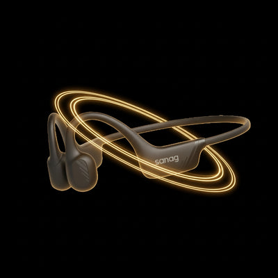 Headphones with glowing outline on a black background