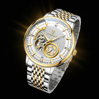 Luxury two-tone watch with intricate design on a dark background