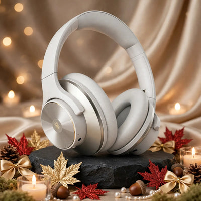 OneOdio A10 white silver headphones correct model with brushed circular metal and gold logo on black slate stone with champagne satin silk, gold and red glitter maple leaves, gold bows, acorns, pearls and candlelight, luxury autumn background