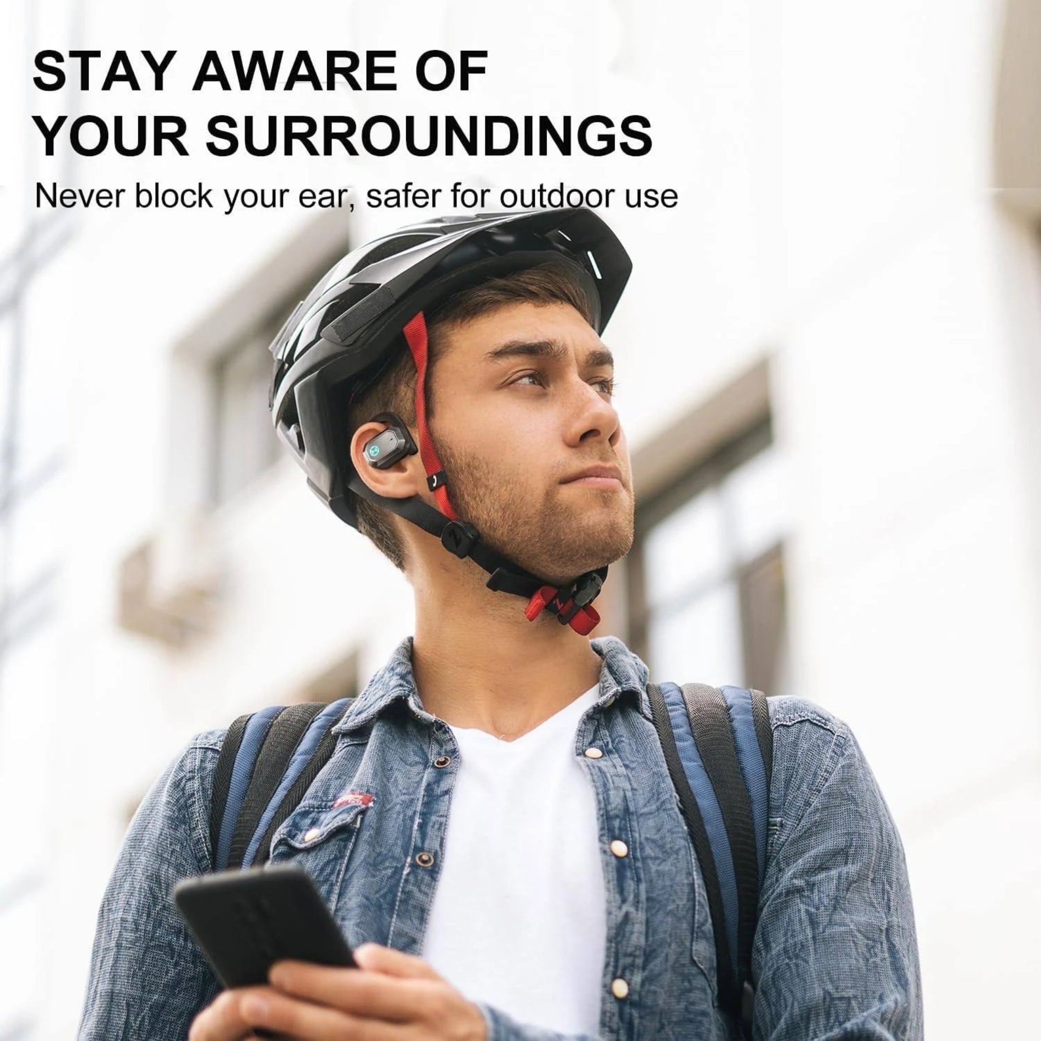 Person wearing a helmet with ear protection, holding a phone, with text about staying aware of surroundings.
