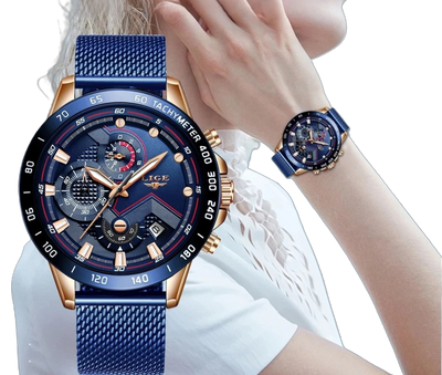 Blue and gold watch with detailed face on a white background